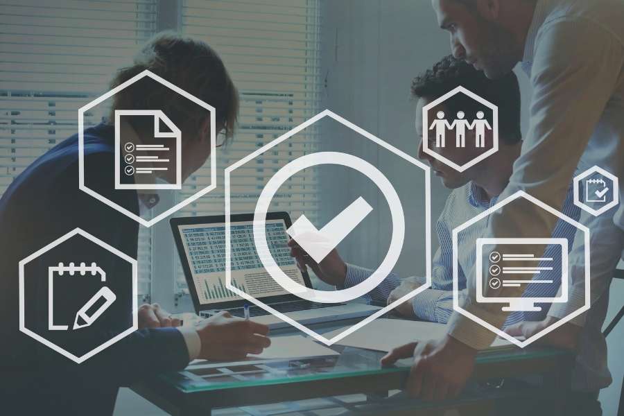 Person using smartphone and laptop for secure blockchain identity verification login process